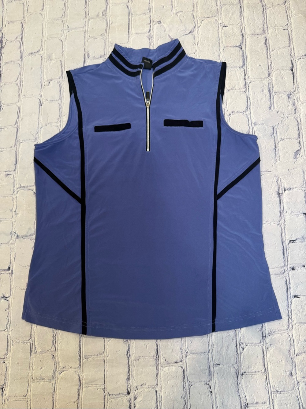 DKNY Golf women's sleeveless 1/4 zip athletic top.